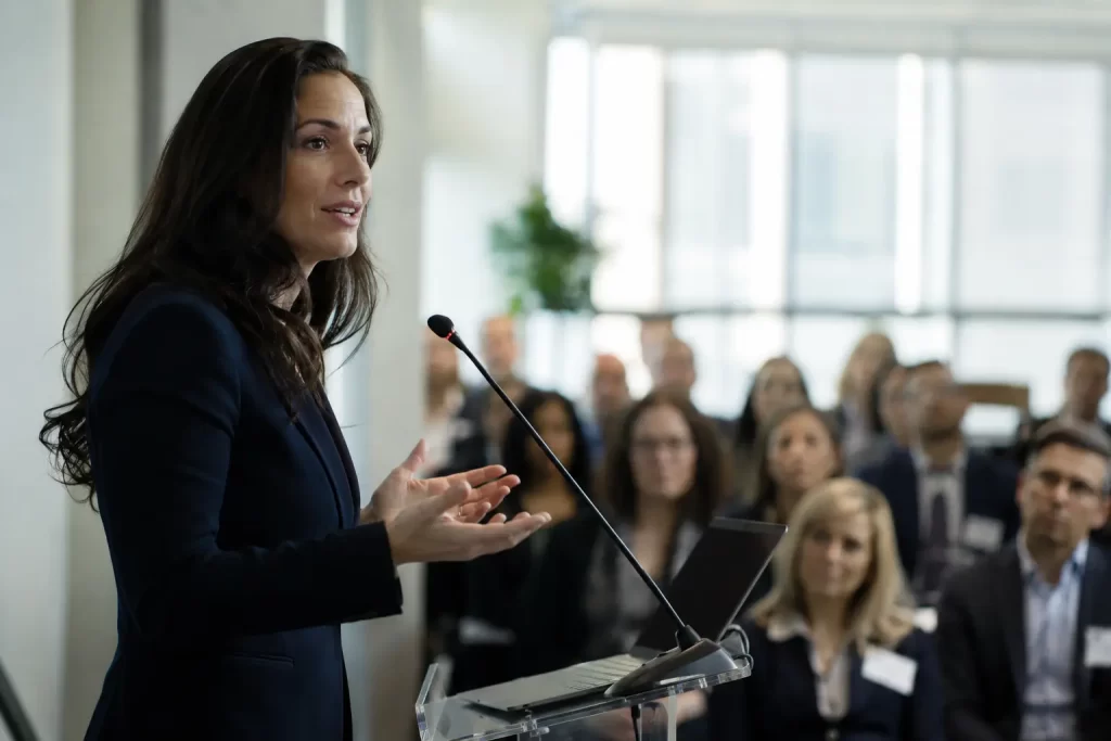 Professional lawyer speaking during a business seminar to build thought leadership and client relationships